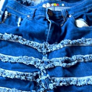 Blue Distressed Jeans with Frayed Detailing